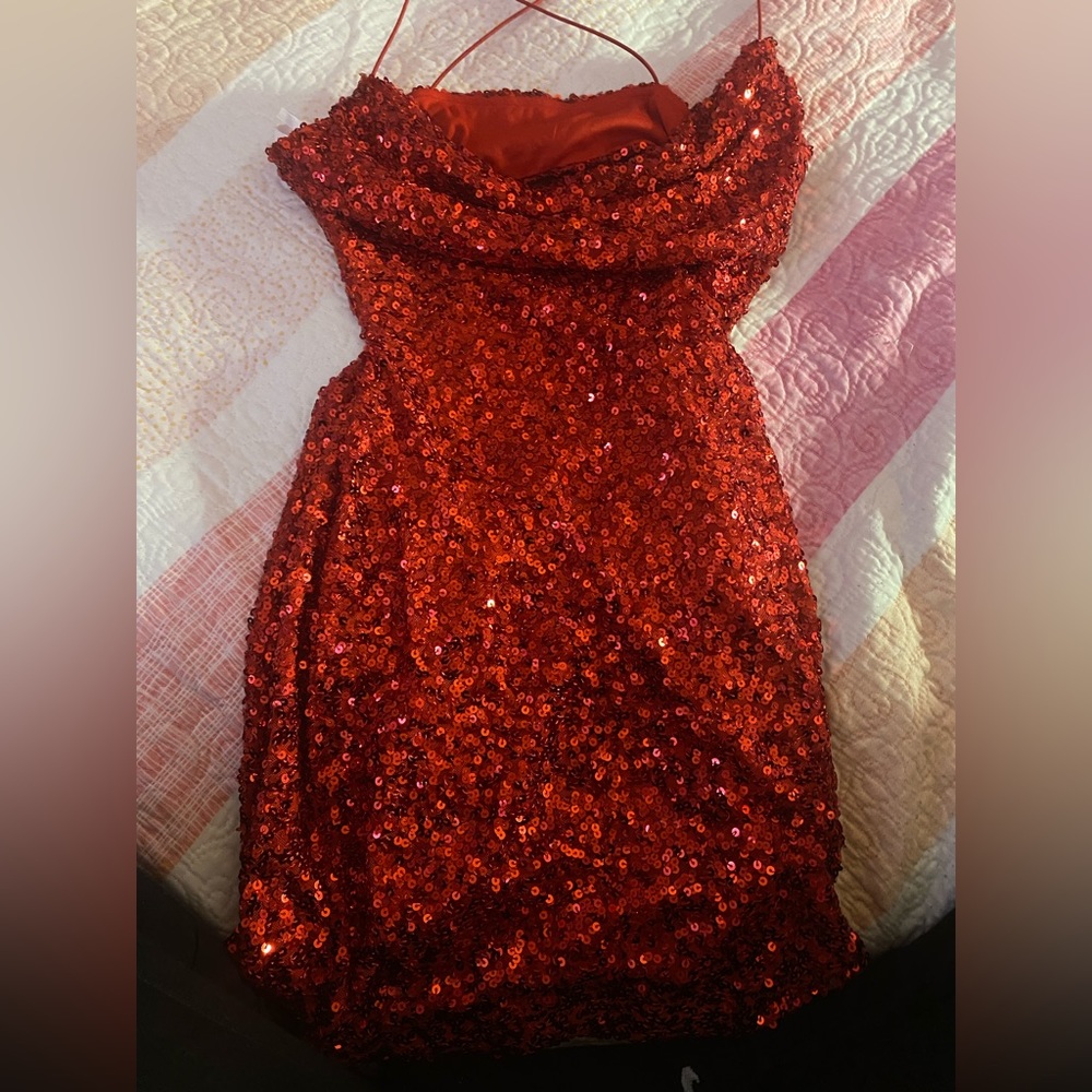 Red sparkly dress just like new was only used at least 1 time dress size-7